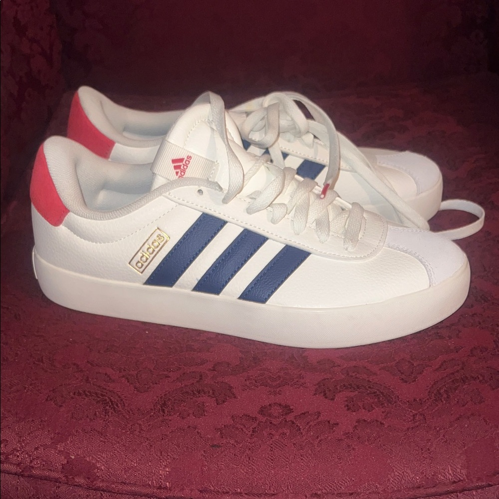 Adidas White Sneakers with Navy Stripes and Red Accents
